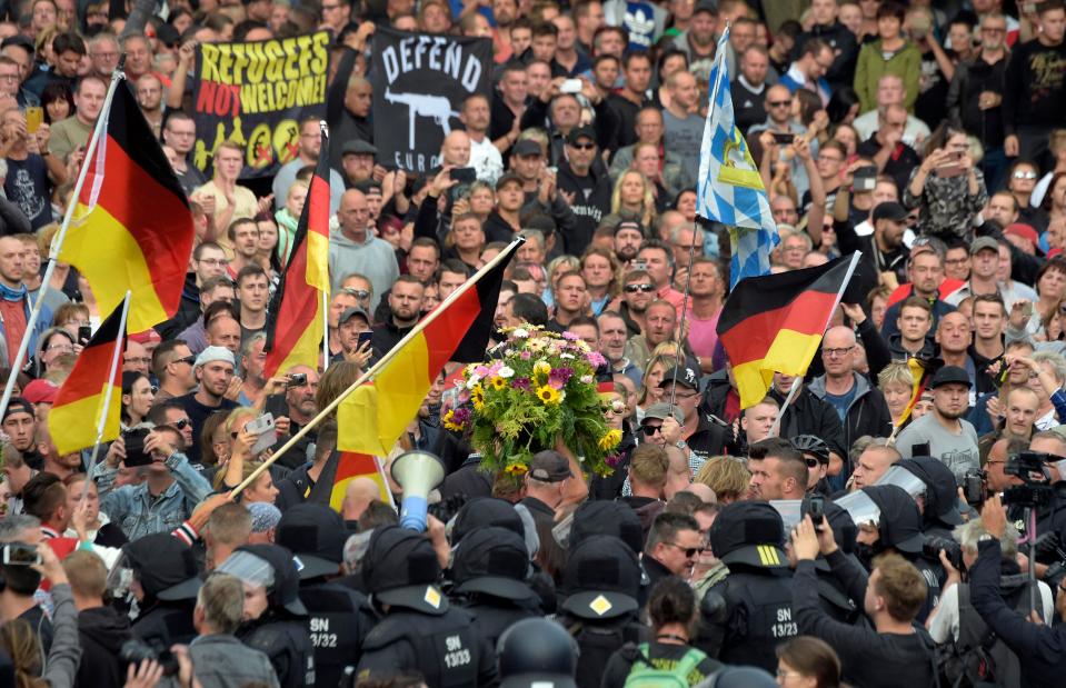  Many of the protesters were waving German flags while chanting Nazi slogans