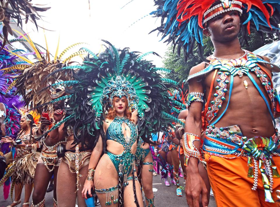  Dancers wore an array of exotic costumes for the Notting Hill Carnival today