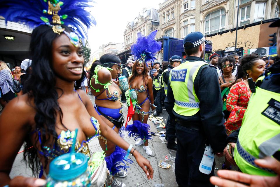  Dancers in incredible costumes joined revellers on the street after the parade came to an end