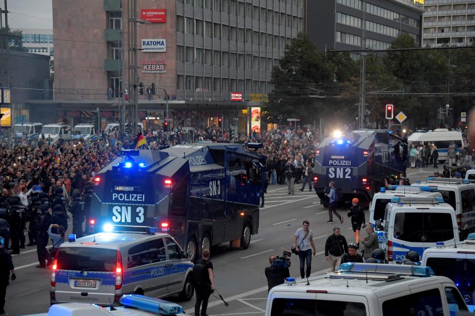  Right-wing supporters protest after a German man was stabbed last weekend in Chemnitz