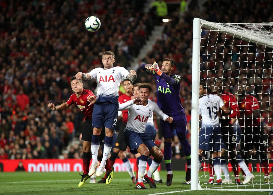  France No 1 Hugo Lloris punches clear for Tottenham in their victory at Man Utd