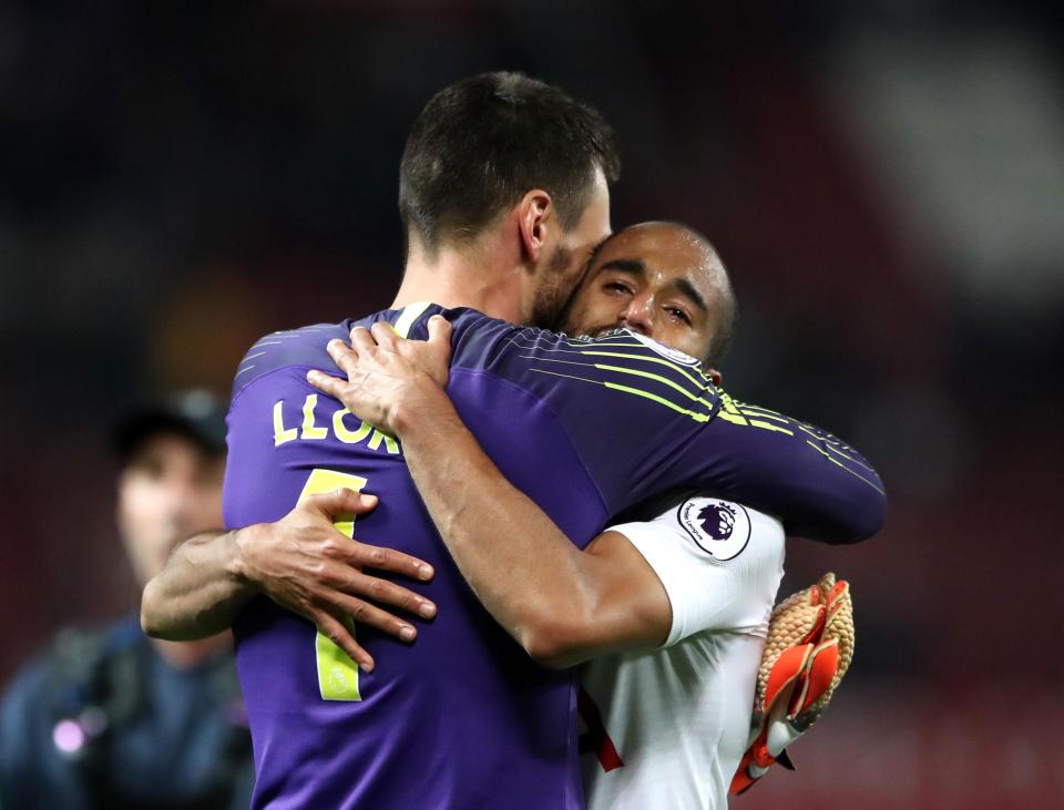  Lloris hugs two-goal hero Lucas Moura at Old Trafford