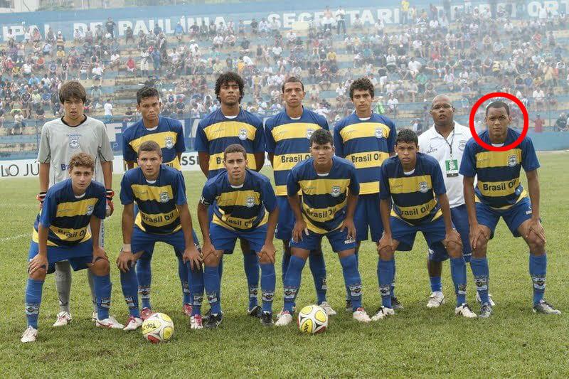 Fabinho, right, in a team shot for his former side Paulinia FC