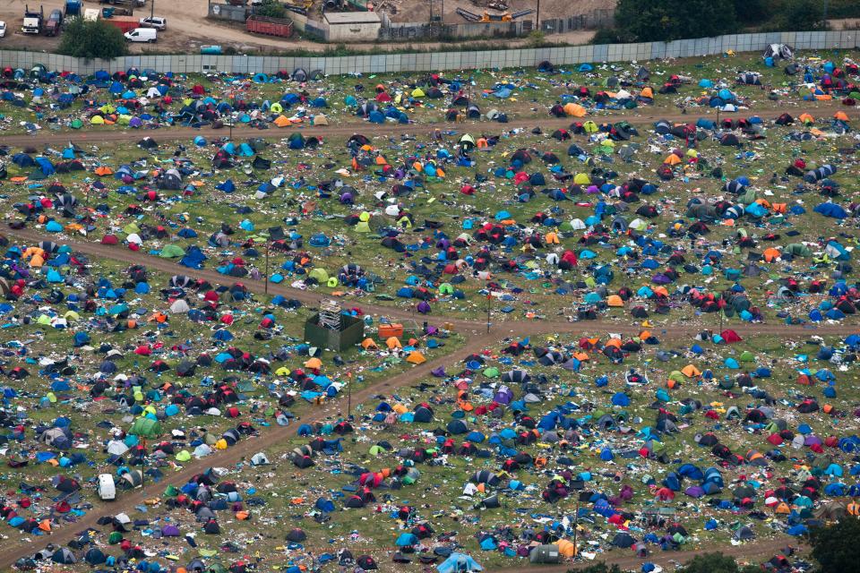  The Reading Festival campsite alongside the River Thames is covered with AT LEAST 60,000 abandoned tents