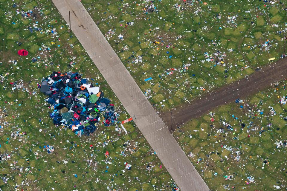  The roadways used to navigate the muddy fields are utterly surrounded by waste in every direction