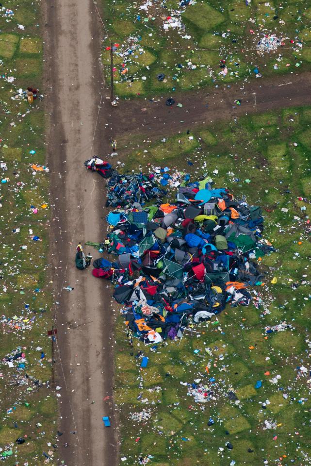  One and two-man tents are being piled up in mountains before being cleared away