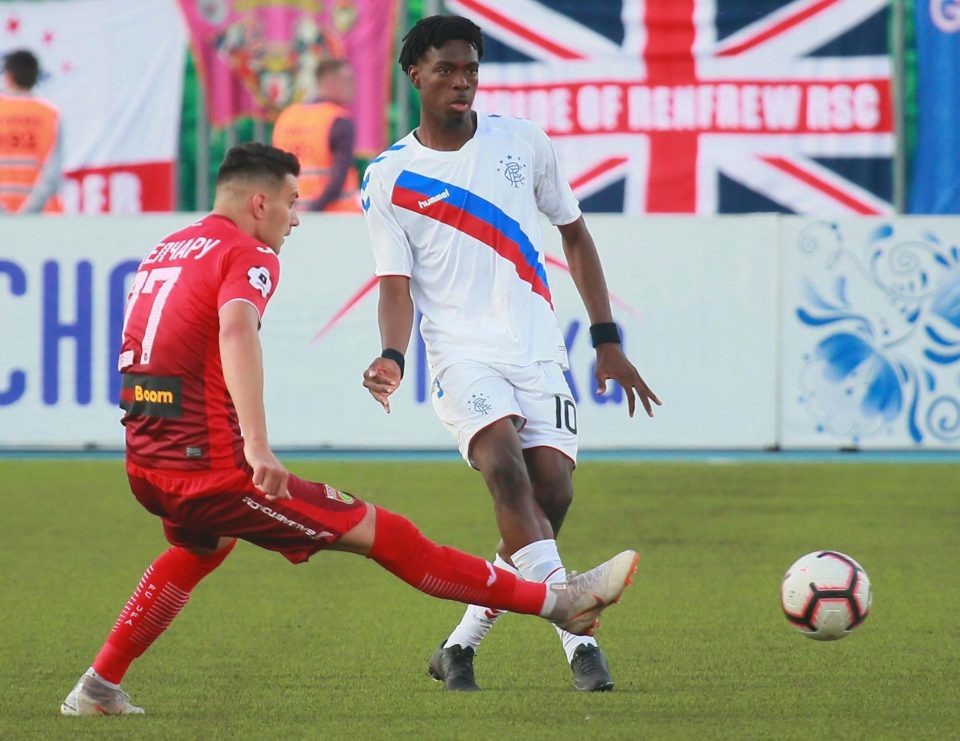 Ufa's Ionut Nedelcearu tries in vain to shut out Rangers' on-loan Liverpool ace Ovie Ejaria 