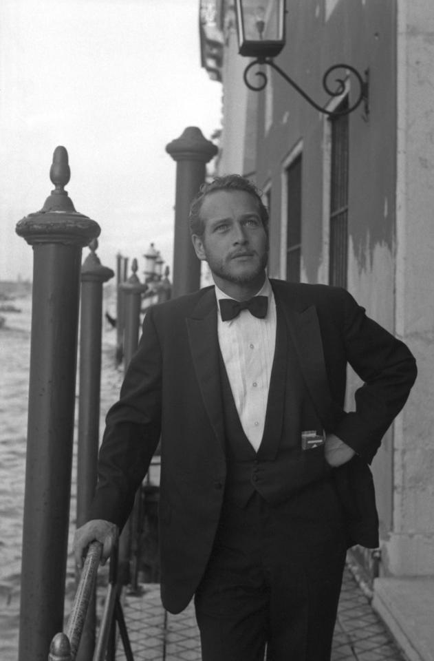  American actor Paul Newman, wearing a tuxedo and a bow tie, on the Grand Canal, Venice, 1963