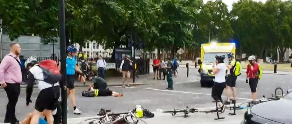  Riders were seen being helped by others after being thrown from their bikes in the crash