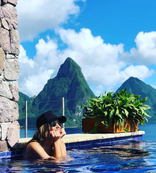  The TV babe has been driving fans wild with her sun-soaked snaps from St Lucia