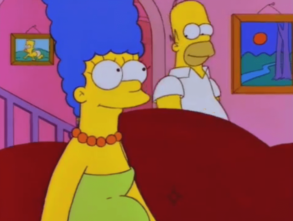  Homer enters his living room to rant at Marge - we see a photo of a baby Bart on the wall