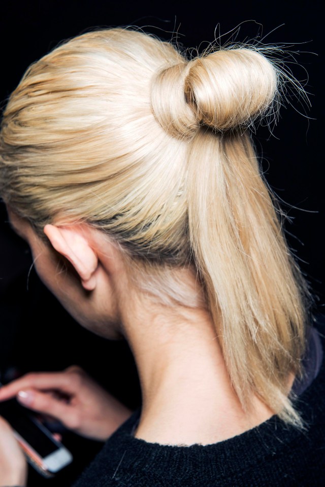 Ditch tired ponytails and topknots and get creative by crossing it with a bun