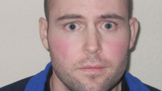  Wild-eyed Jonathan Kelly is one of the nation's most wanted men after a terrifying machete attack