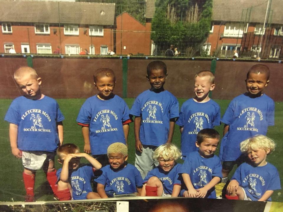  Rashford, at the centre of the back row, as a youngster at Fletcher Moss Rangers