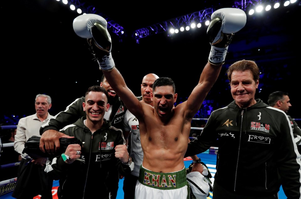 Joe Goossen, right, celebrates following Amir Khan’s win over Phil Lo Greco