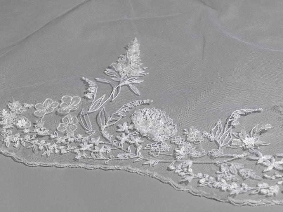  The delicate veil took 500 hours to embroider with the flowers