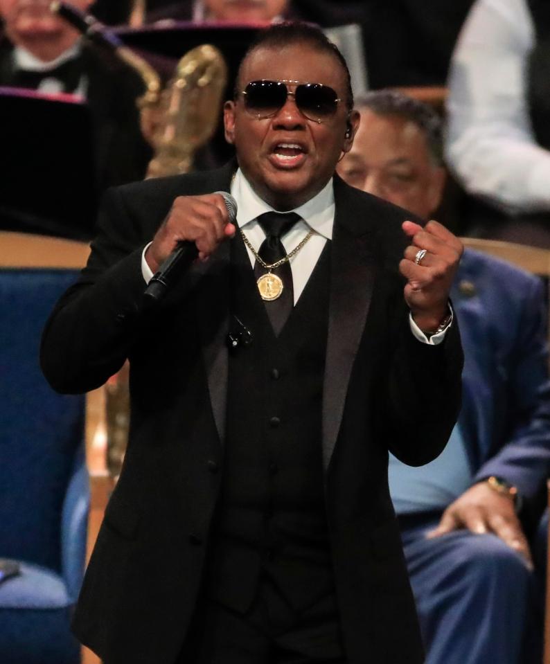  Ron Isley sings during the funeral service for the soul superstar