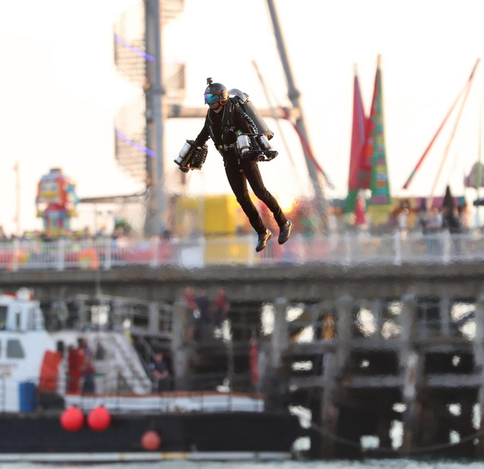  The daredevil jetpack pilot pulled his arm away from the rest of his equipment which sent him into a spin