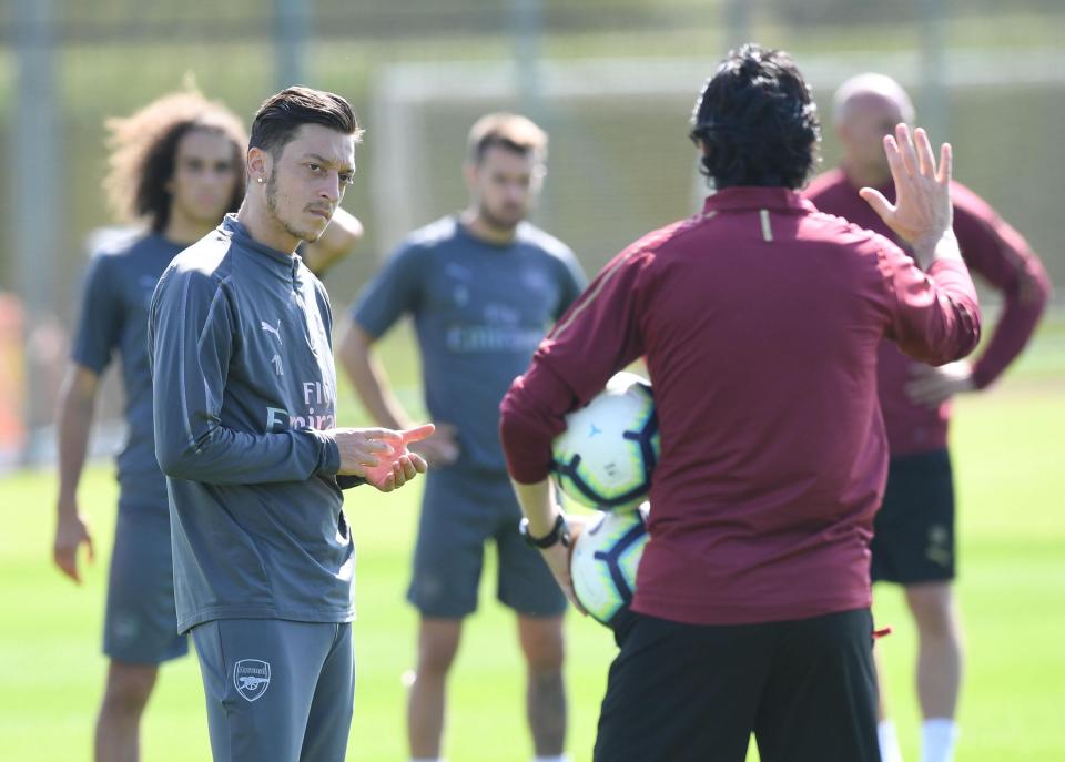 Emery shot down reports that he doesn't have a good relationship with Mesut Ozil