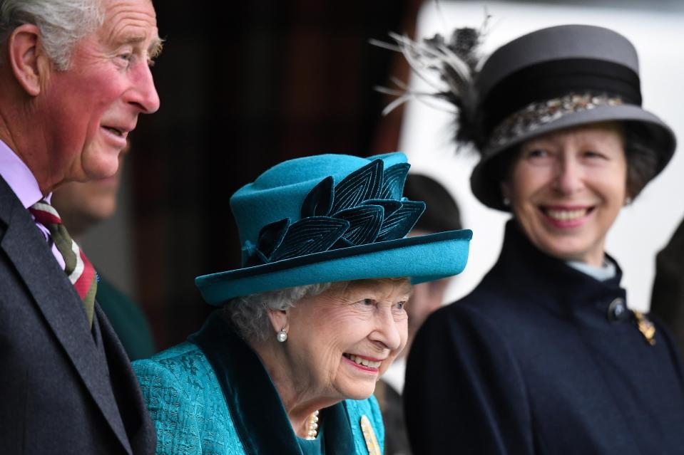  The Queen beamed alongside her children Prince Charles and Princess Anne