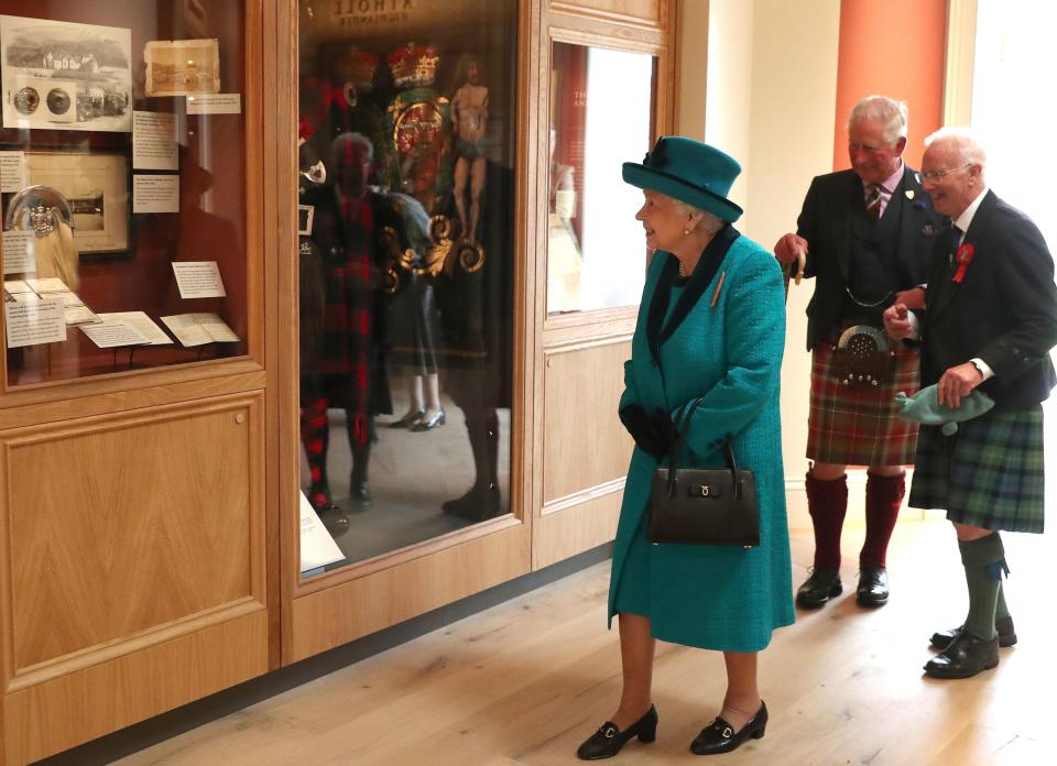  Before leaving, the Queen and Prince Charles, the Duke of Rothesay, officially unveiled the newly-built Highland Games Pavilion