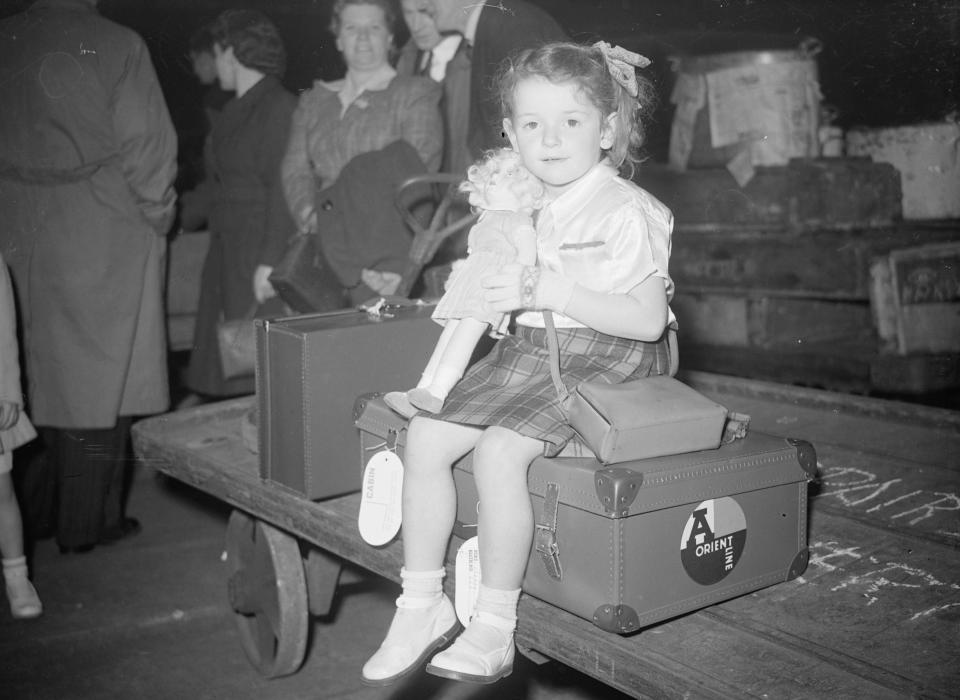  A young girl waiting for her train to Tilbury where she along with 1,100 others would set sail to Australia