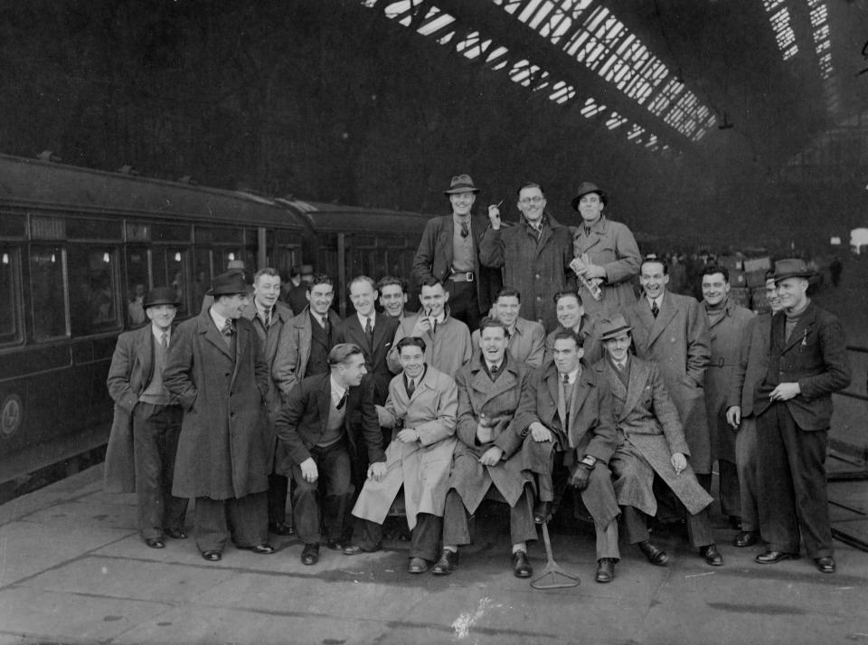  A group of builders before boarding their train at London St Pancras