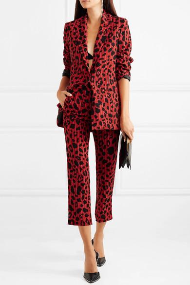 The bold Koché blazer costs £625 and has a leopard-print design with contrasting pinstripes