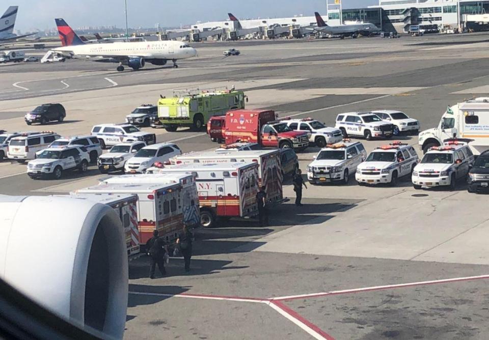  Emergency services were pictured on the tarmac at JFK to meet the plane