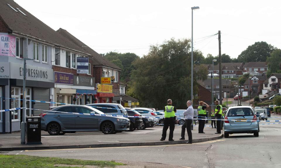  Police spoke to witnesses after an off-duty cop was stabbed in a failed car-jacking this afternoon in Birmingham