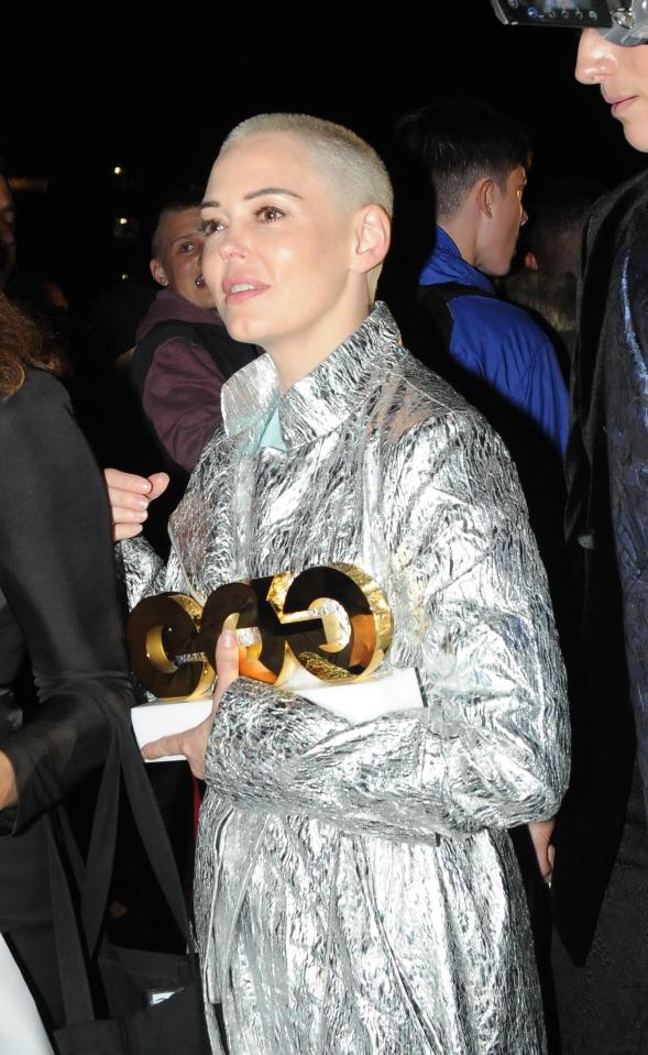  Rose McGowan was seen clutching her award