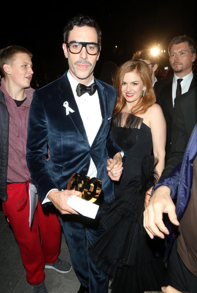  Sasha Baron Cohen look pleased as he left the bash with his award