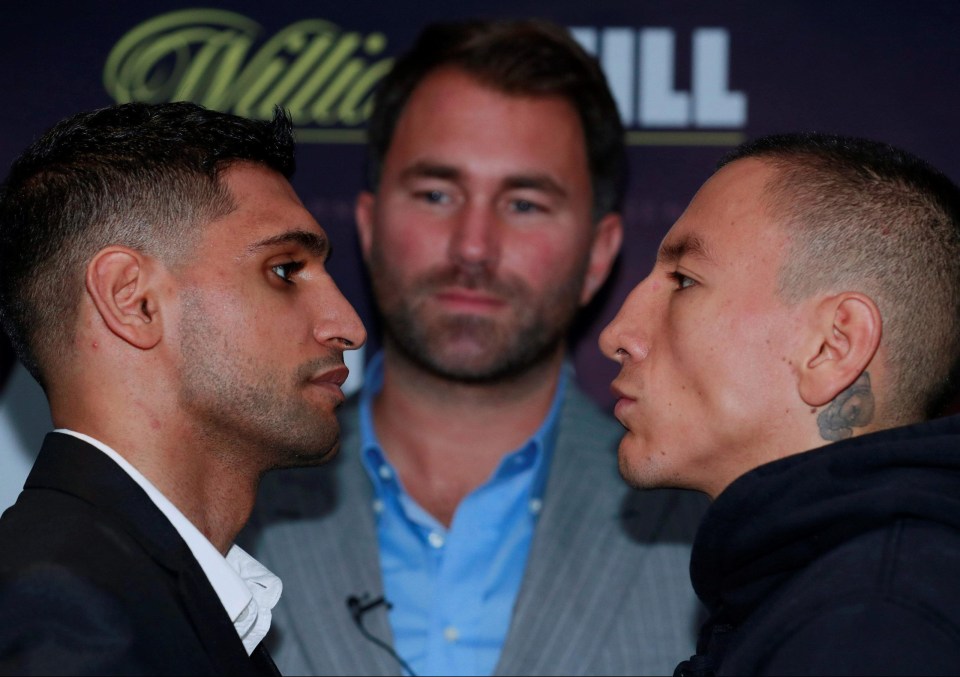 Promoter Eddie Hearn watches on as Khan squares up to Vargas