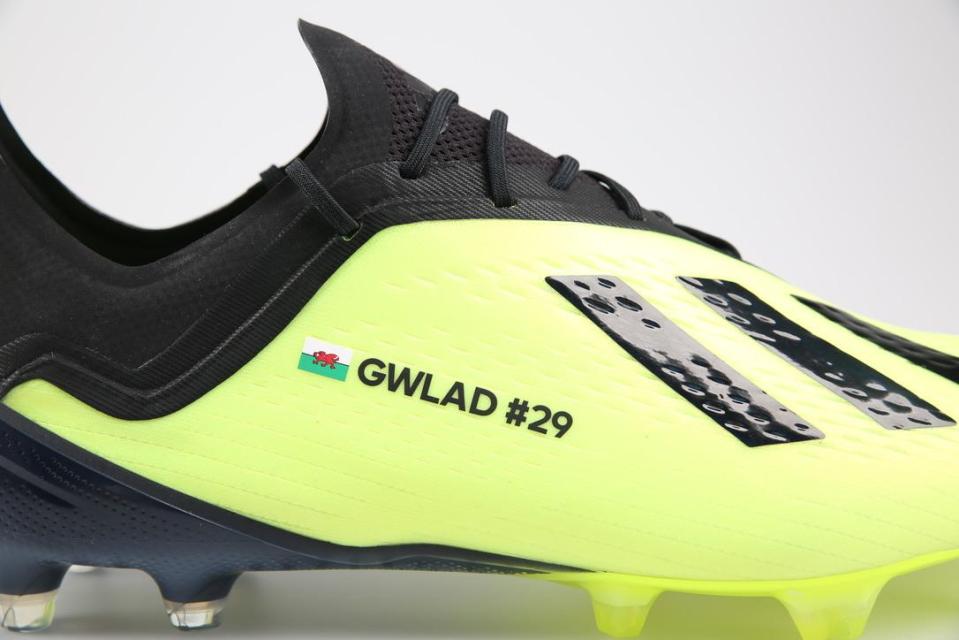  The Welsh flag is shown on the side of the boot, along with the number of goals Bale has netted for his nation