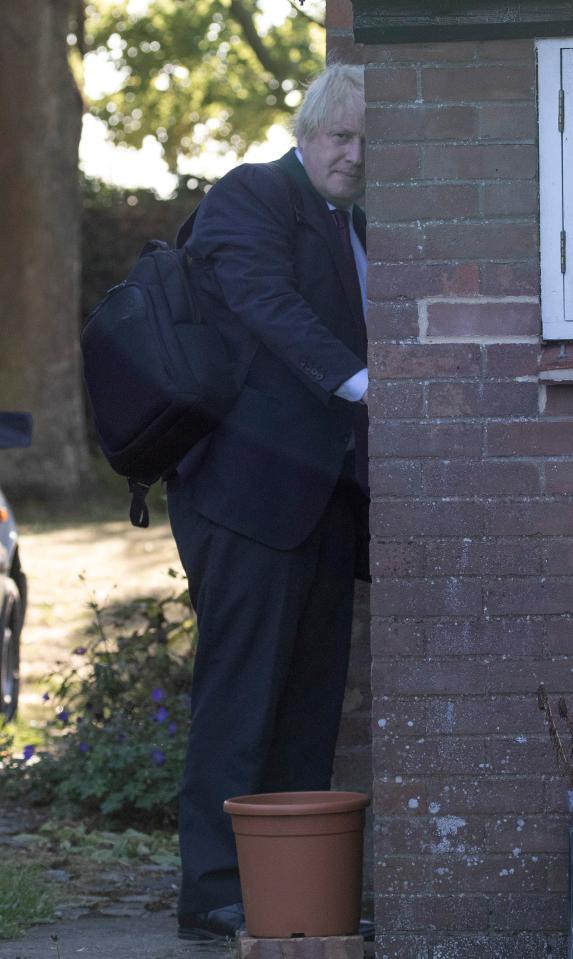  Boris, 54, leaves his home today following the bombshell divorce announcement