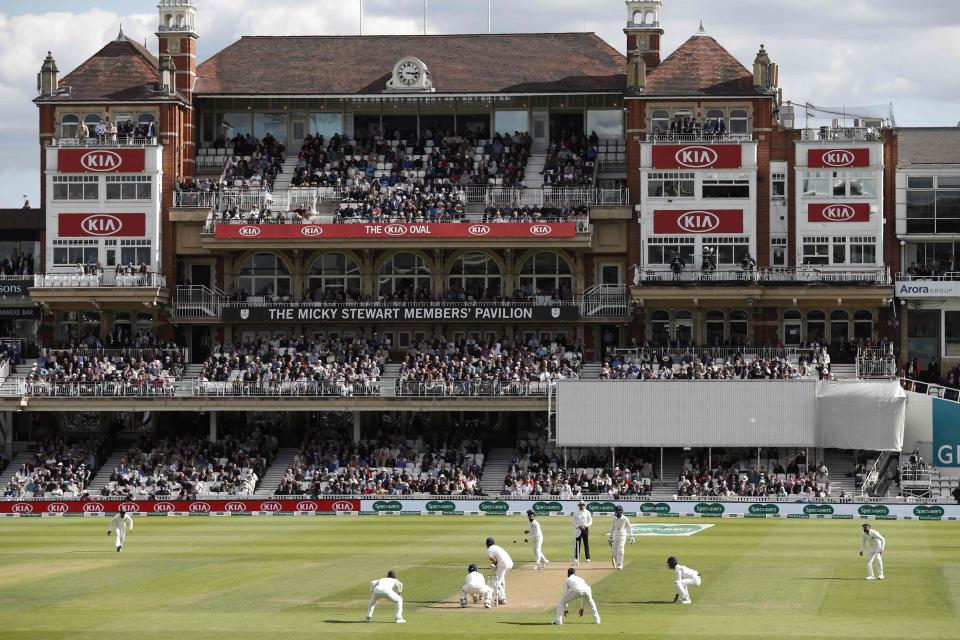 India's Ravindra Jadeja bowls to England opener Alastair Cook on the first day of the Fifth Test