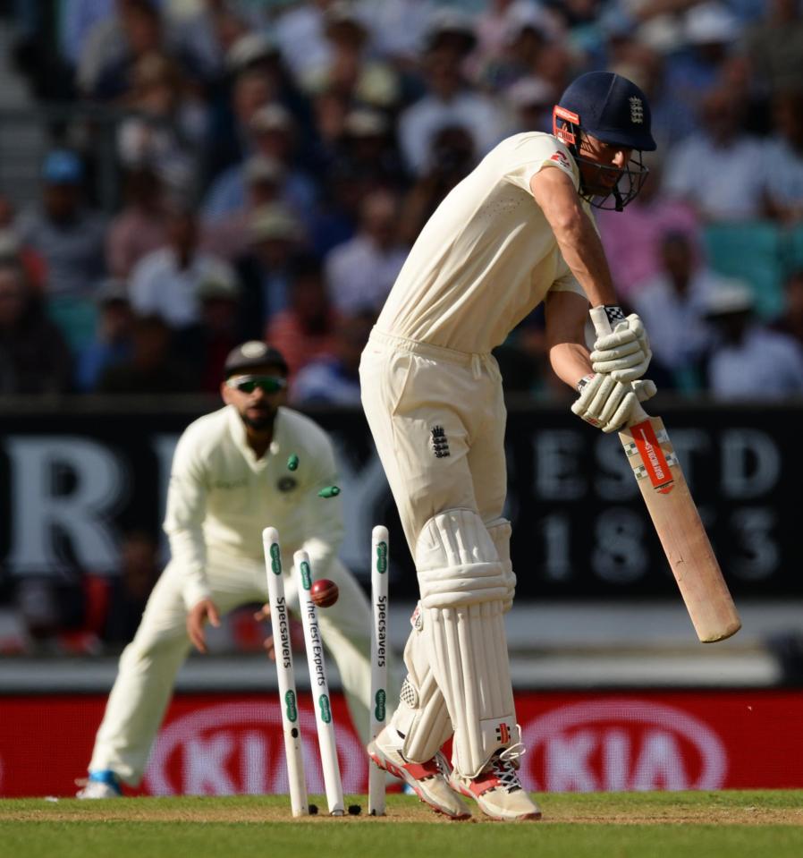  Alastair Cook sees his middle stump cleaned out to end hopes of a century