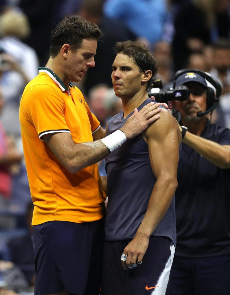  Juan Martin del Potro consoles Rafael Nadal following the match