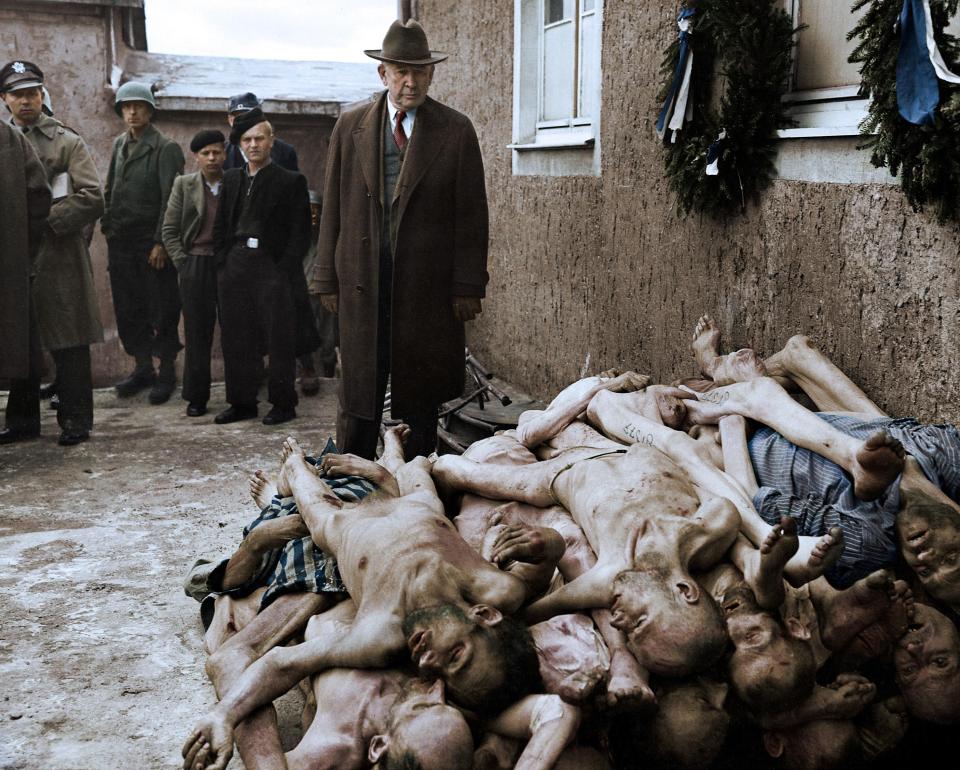  Senator Alben W. Barkley, member of a committee investigating Nazi atrocities takes a look to a pile of bodies at Buchenwald concentration camp