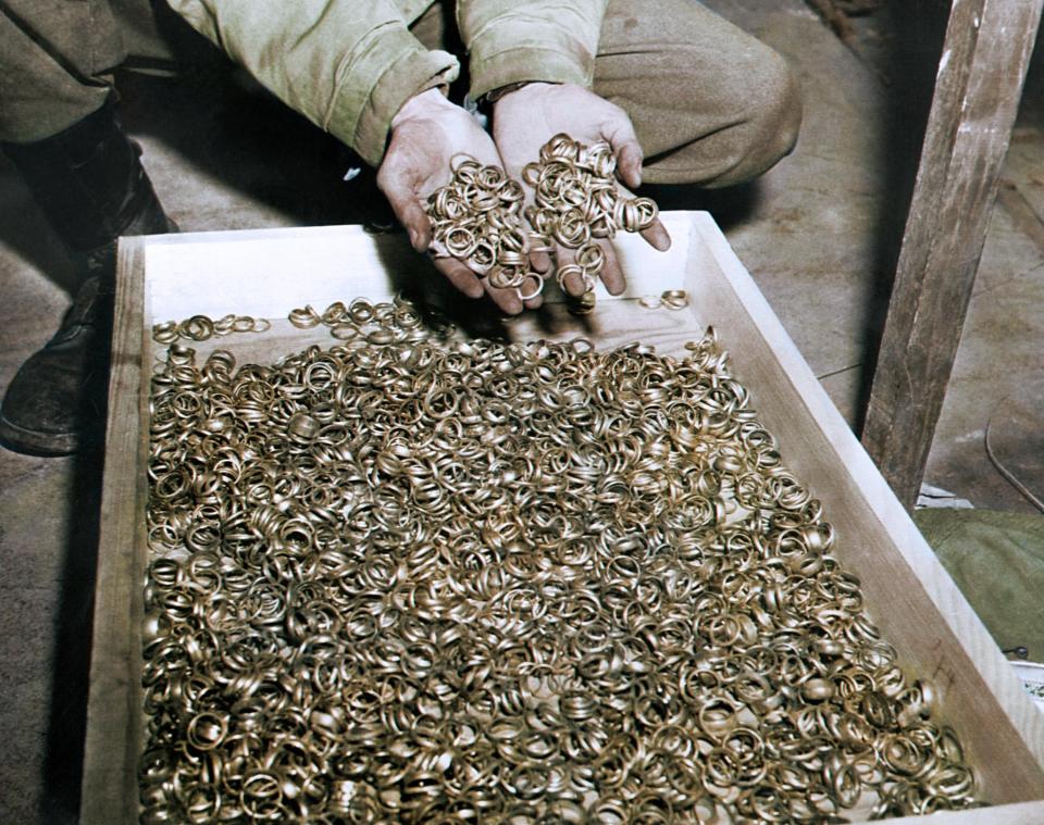  A few of the thousands of wedding rings the Nazis removed from their victims to salvage the gold, in a cave near the Buchenwald concentration camp