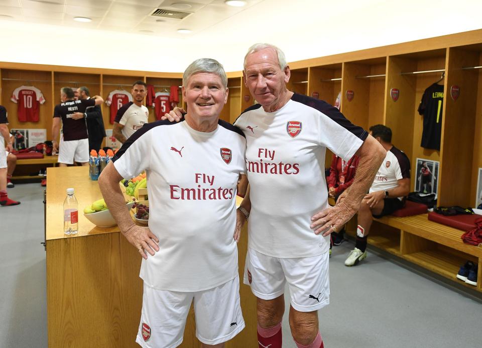  Arsenal assistant manager Pat Rice and goalkeeping coach Bob Wilson pose in the home changing room.