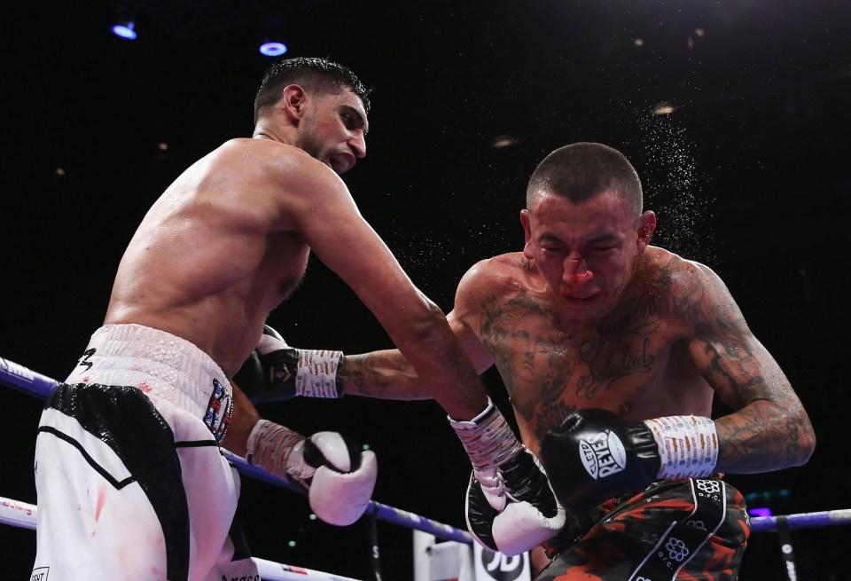 Amir Khan came up off the canvas to edge past Samuel Vargas on points in Birmingham