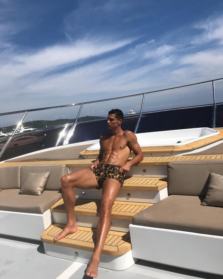  Cristiano Ronaldo showed off his ripped body on a luxurious boat during a family holiday