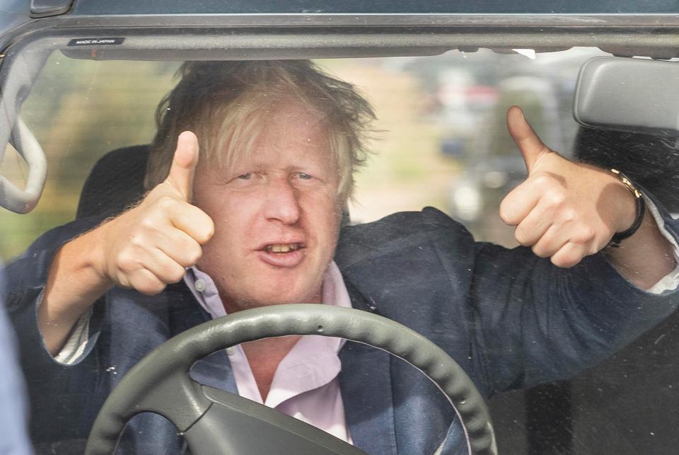  Boris giving the thumbs-up outside his Oxfordshire home today