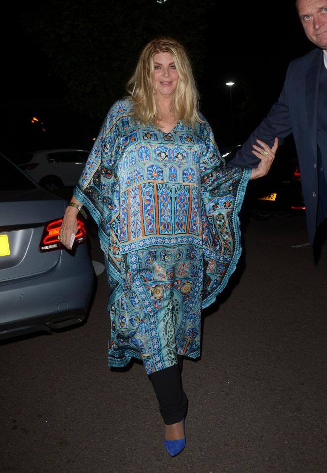  Kirstie Alley wows in a blue dress as she celebrates CBB success