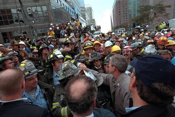  Bush met with firefighters and the families of victims of the attacks