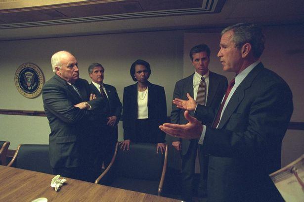  Bush is seen discussing events with aides in the aftermath of the attacks