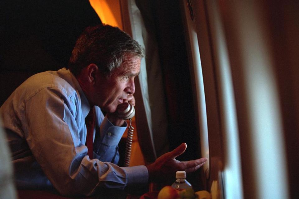  The President anxiously talks on the phone while on Air Force One