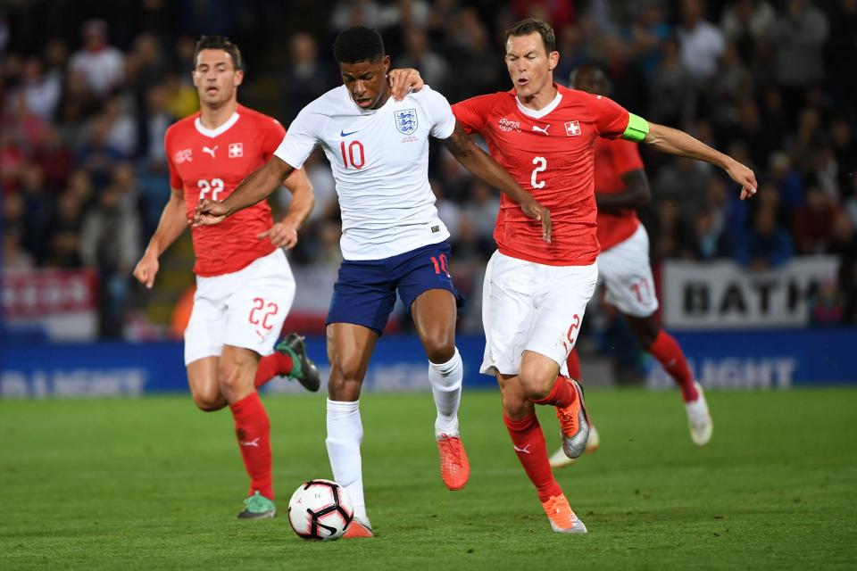  Marcus Rashford in action against Arsenal ace Stephan Lichtsteiner