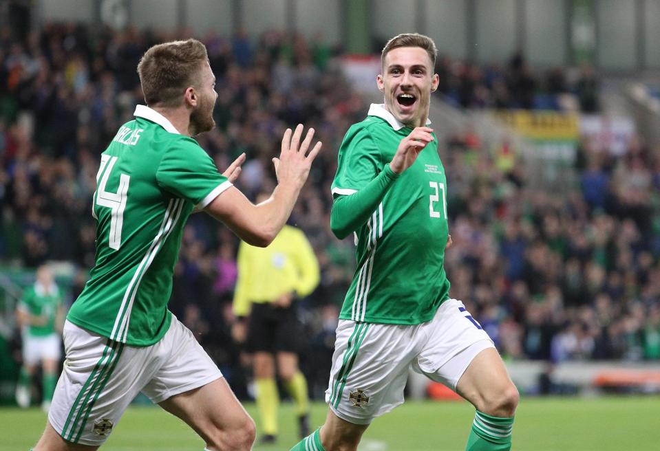  Whyte, 22, wheels away in delight after netting the third goal against Israel